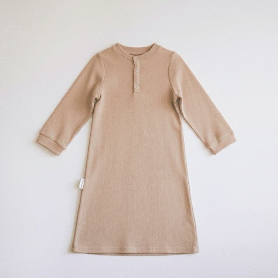 Beigenight gown with long sleeves on a white background